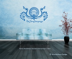 Modern blue couch in front of colorful wall